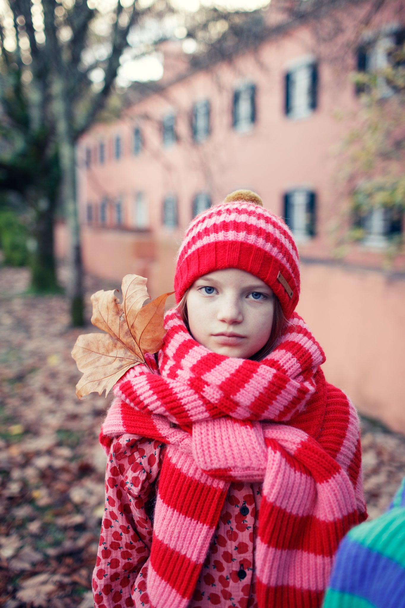 Piupiuchick knitted hat with pompon RED AND PINK STRIPES