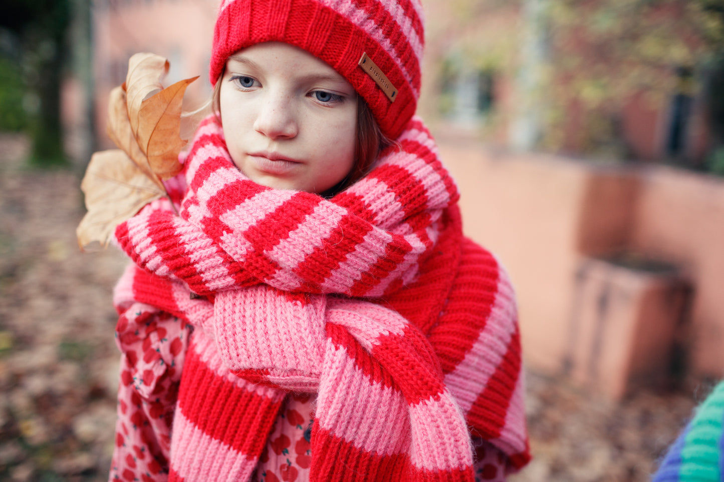 Piupiuchick knitted hat with pompon RED AND PINK STRIPES